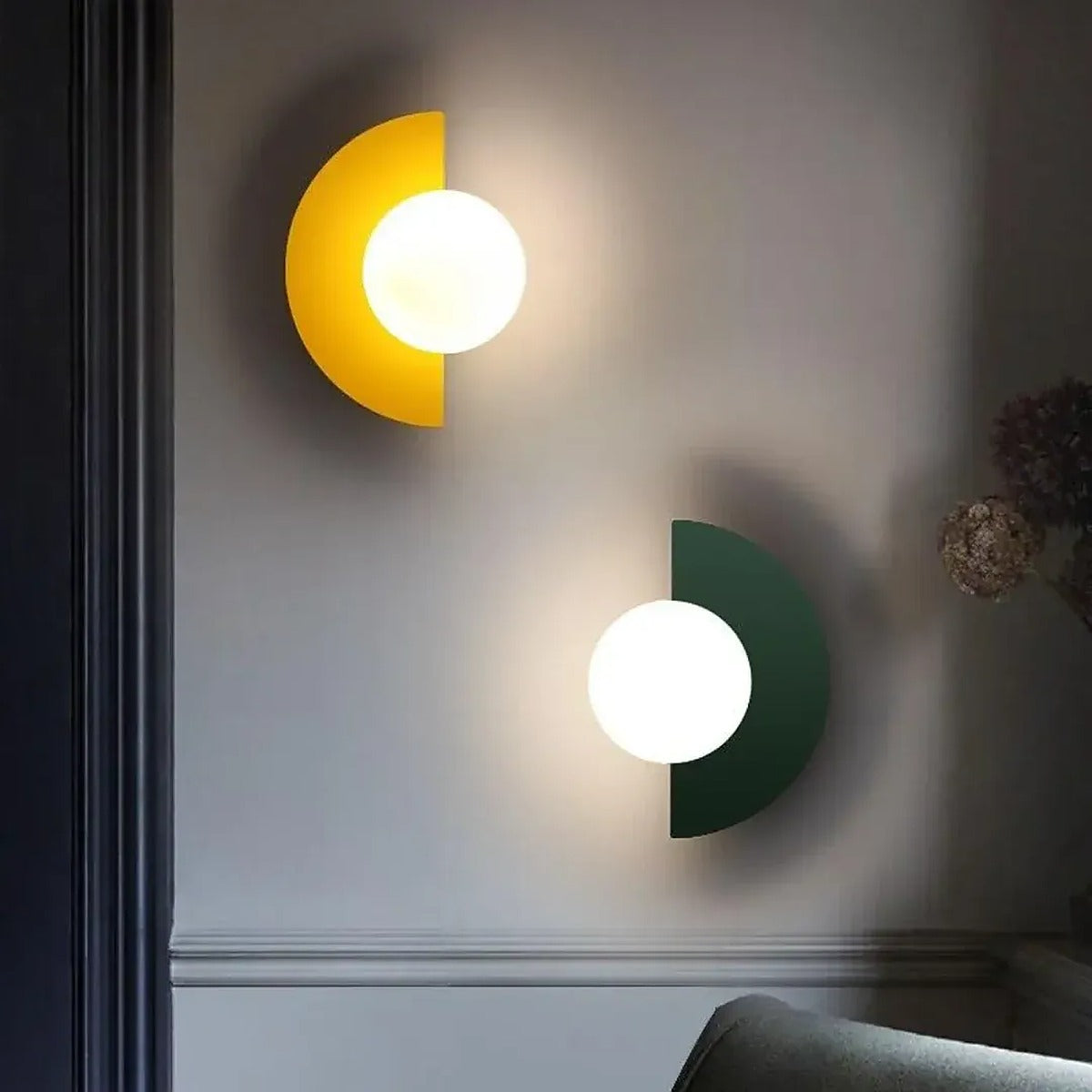 Cleo wall lights in yellow and green mounted sideways