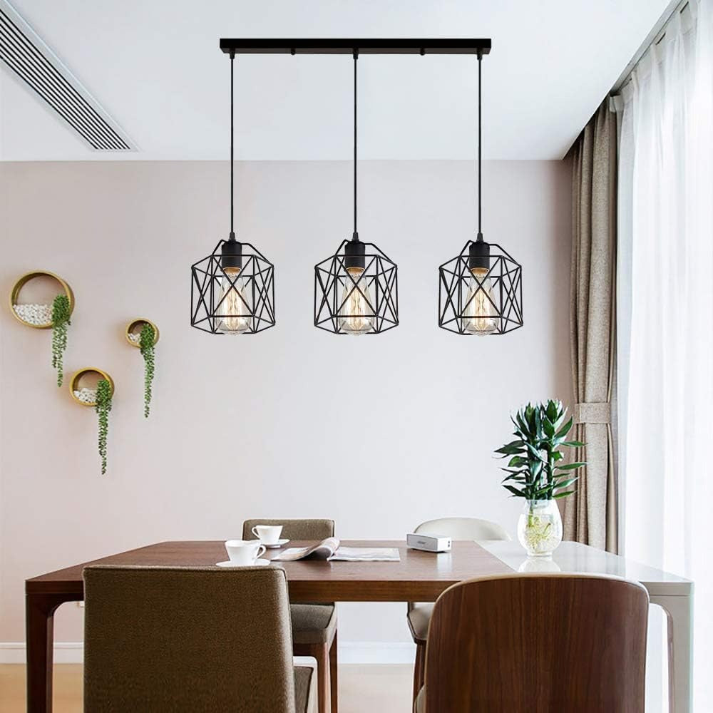 Hudson black cage 3-light pendant bar above a timber dining table