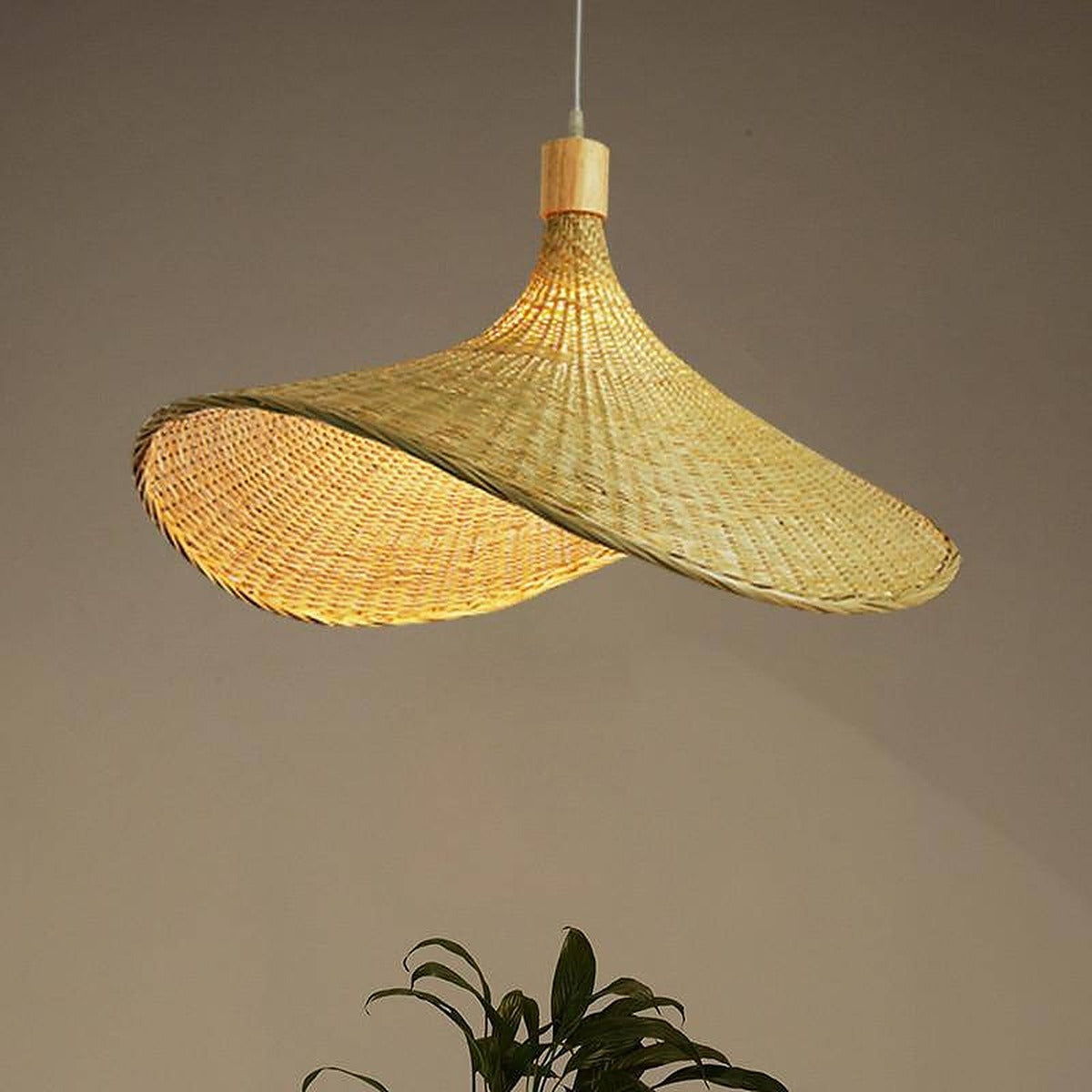 Kasa hand-woven bamboo hat pendant light with wooden holder cover, lit