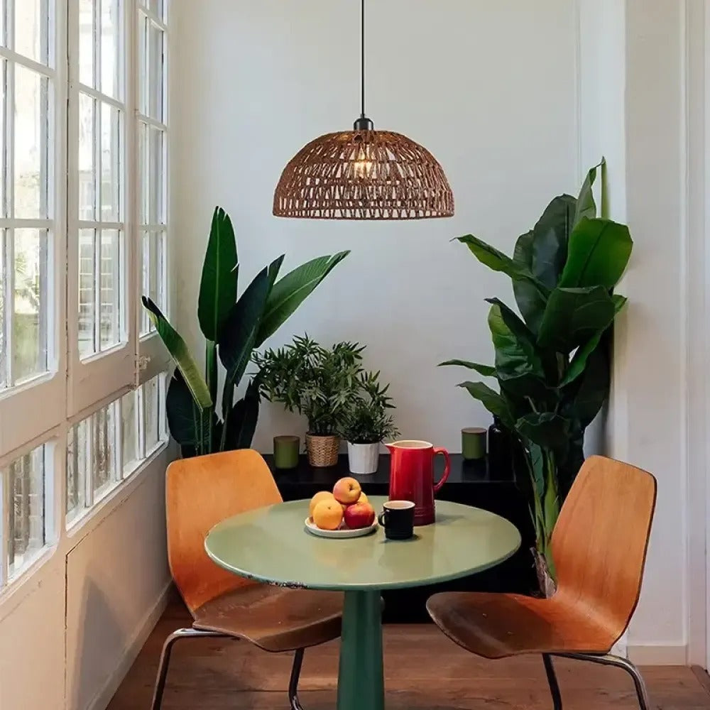 Sora pendant in Brown over a breakfast table