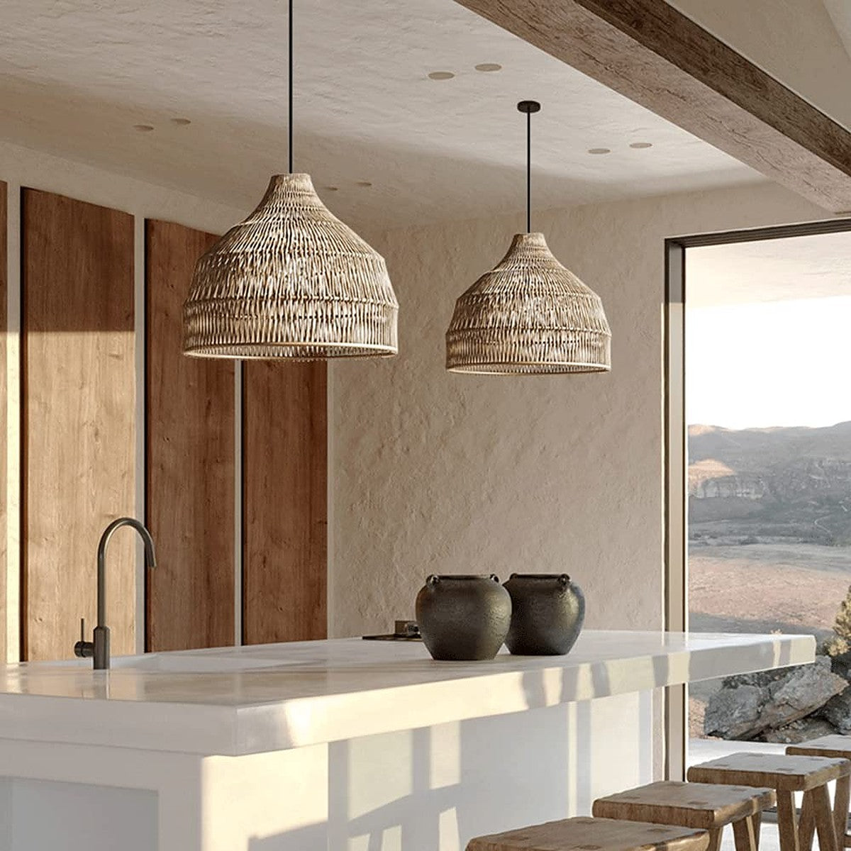 Two Dune rattan pendant lights over a white kitchen island
