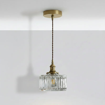 Clara ribbed glass pendant light in clear glass with brass finish