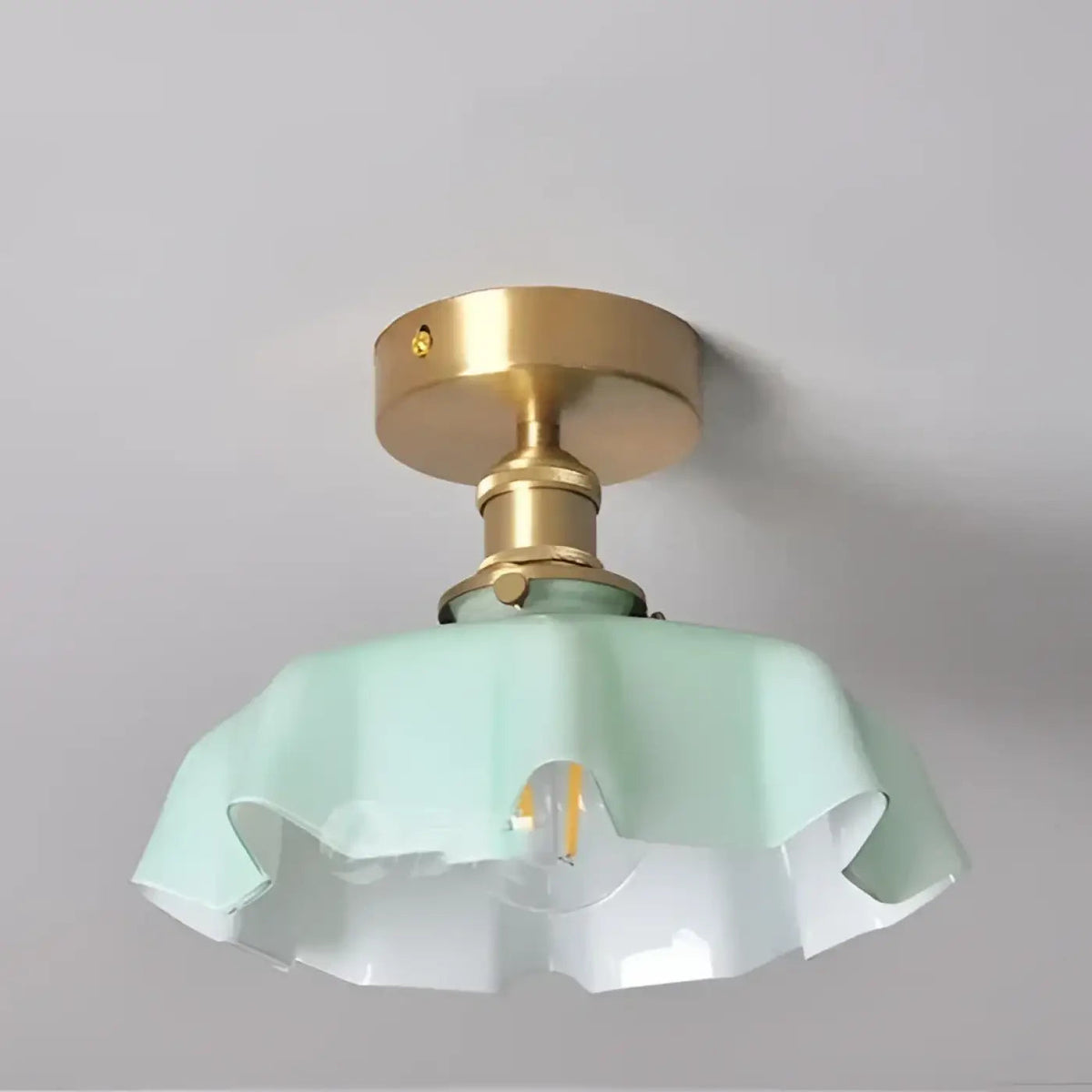 Fleur scalloped glass semi-flush ceiling light in green with brass-finish mount