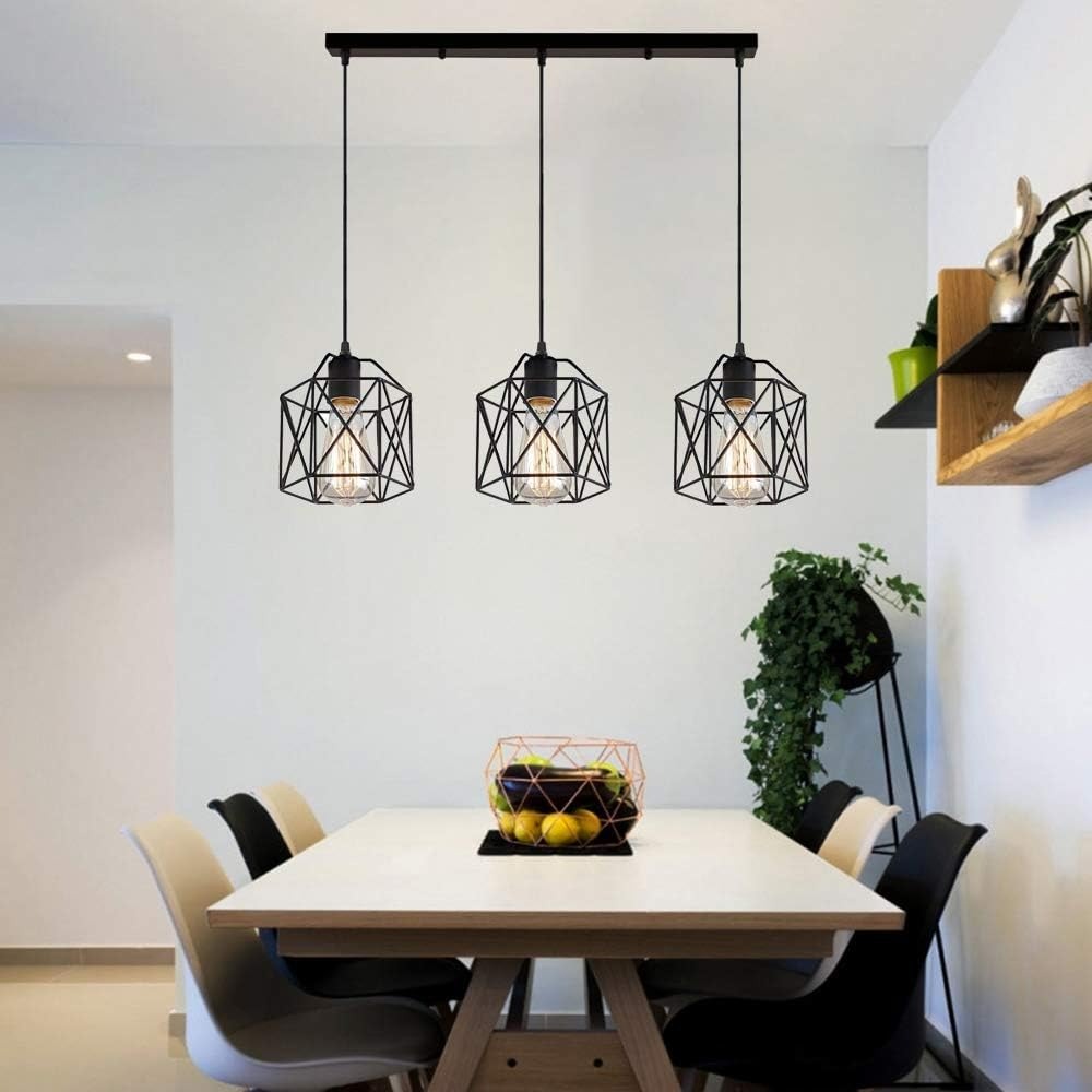 Hudson black cage 3-light pendant bar in a white Scandi dining room