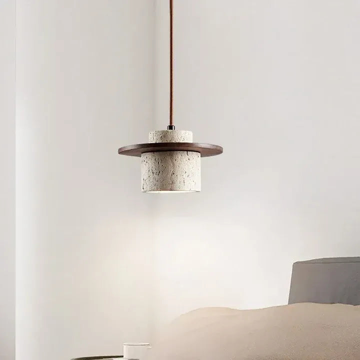Stonova travertine and walnut pendant light in a bedroom